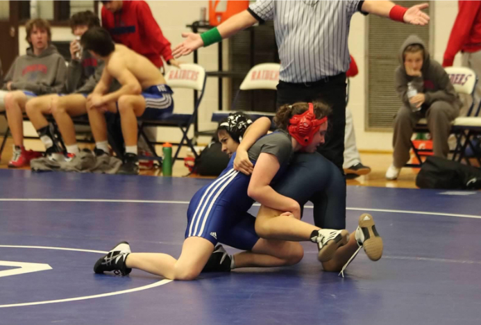Wrestling is a collaborative sport that involves hard work and discipline.
