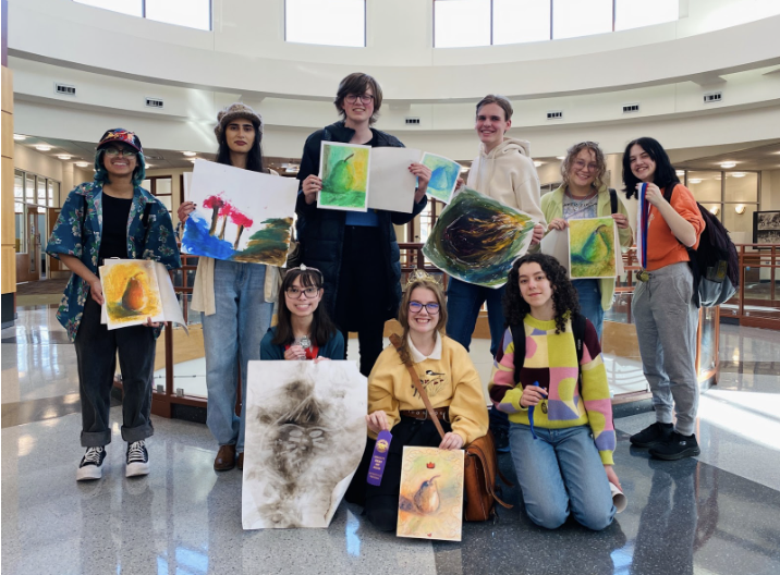 Nine Glenbard South art students visit the Gail Borden Library in Elgin to represent Glenbard South at The Upstate Eight Art Conference.