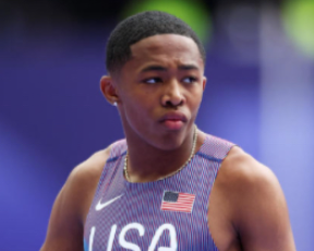 Quincy Wilson during a moment of rest at the Olympics. Source: US Weekly