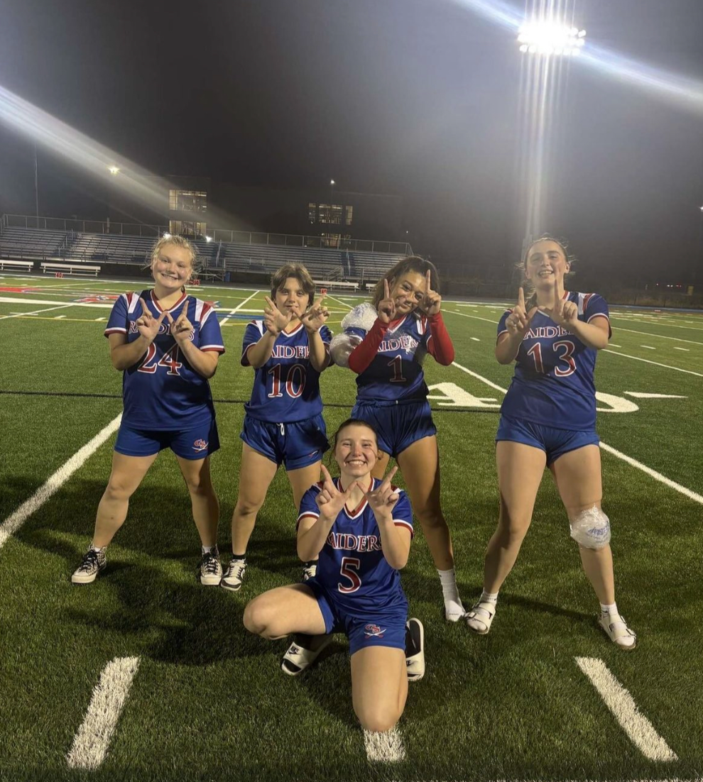 South’s girls flag football team holding up a “W” after winning against Fenton 38-0. (Source: gbs_flag_football on Instagram)
