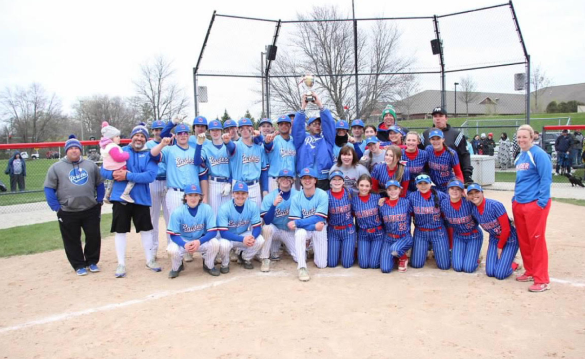 Softball and Baseball teams pose for a picture after the first annual showdown (Keith Lavin on X)