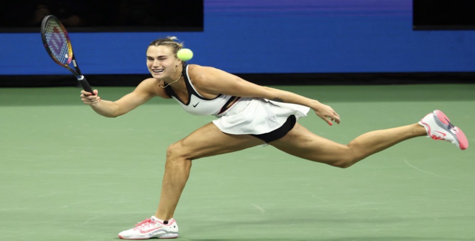 Aryana Sabalenka forcefully hitting a tennis ball (US Open.org)
